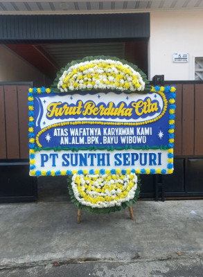 Papan Bunga Duka di Supiori
