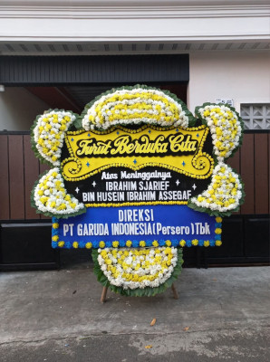 Papan Bunga Duka di Supiori